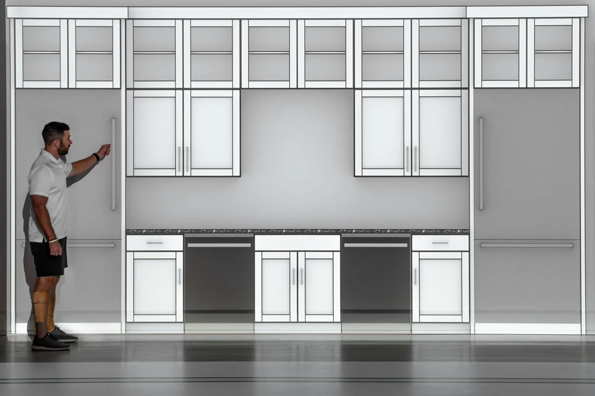 Man reviewing a life-size wall projection at Walk Your Plans